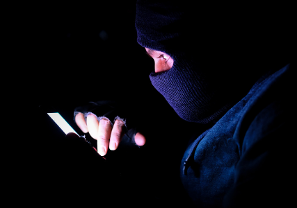 Cyber hacker in the dark